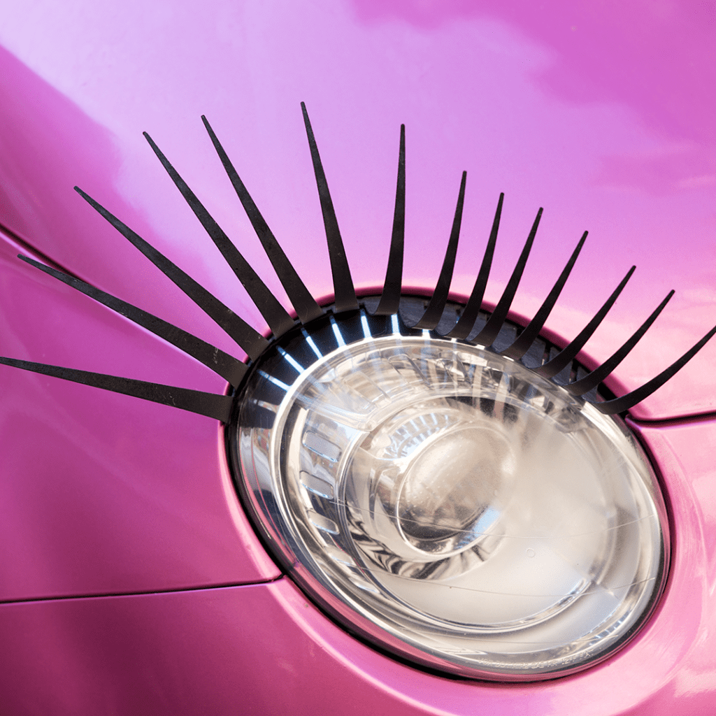 Decorative giant eyelashes installed on a car’s headlights